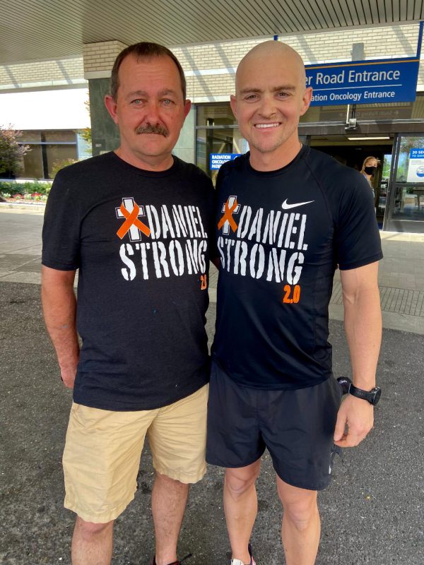 Daniel Allemond with his father Chris.