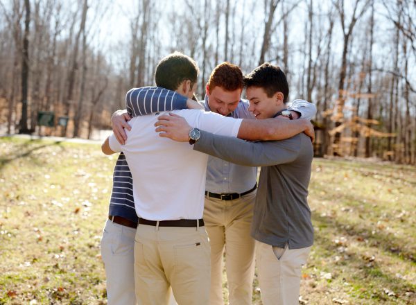 Brothers embracing