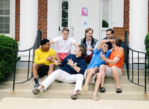 A group of brothers laughing and socializing