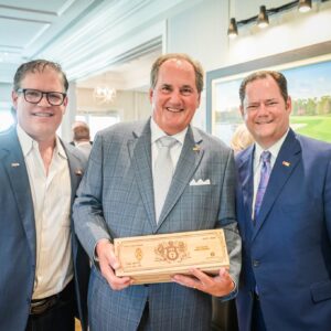 KAOEF Chairman Scott Heath with Brandon Chaney and Executive Director Larry Wiese at the Crimson and Gold Society Dinner