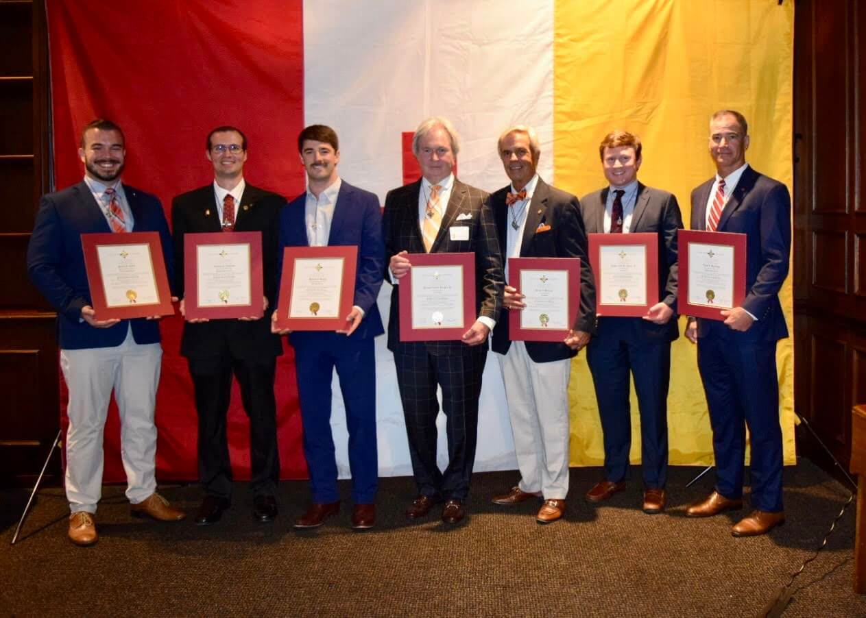 2023 Inductees with Certificates in front of large KA flag