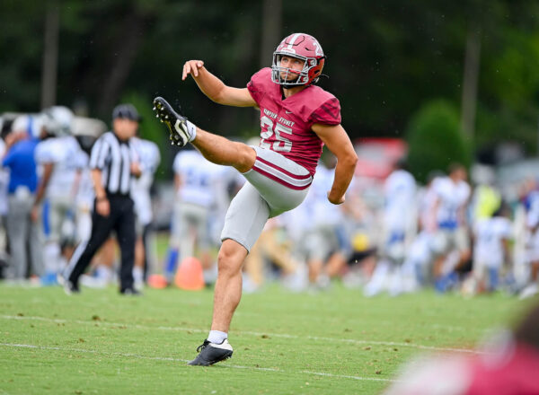 George Langhammer punting