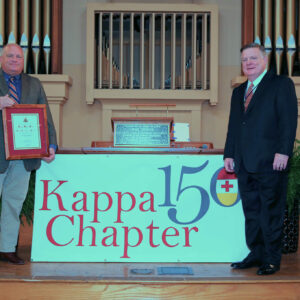 Lee Oliver with Knight Commander Aiken in front of Kappa 150 banner