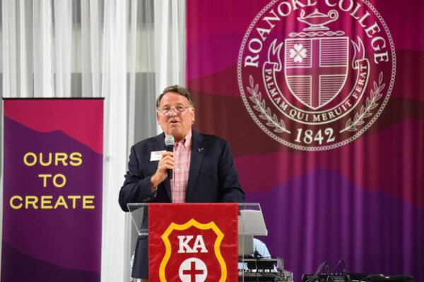 Dale Sarjeant speaking at podium