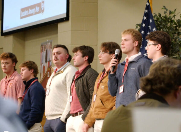 young men speaking