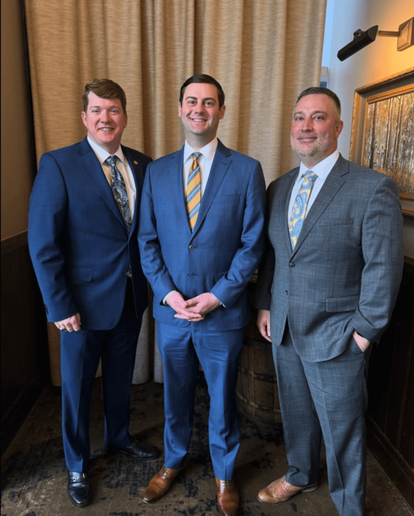 three men in suits