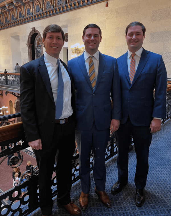 three men in suits
