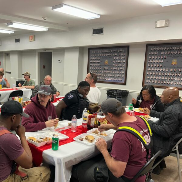 police and fire fighters eating at table