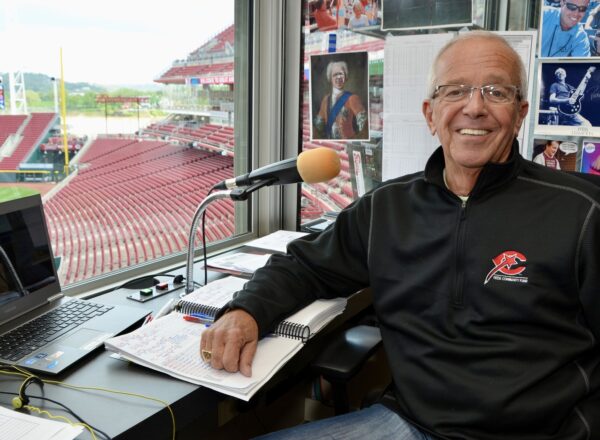 man in press box