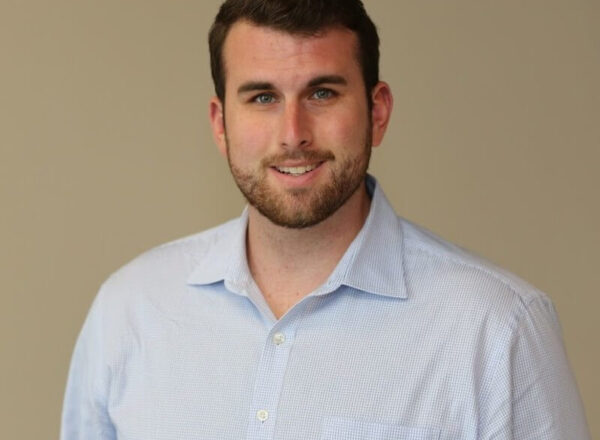 headshot of man in collared shirt