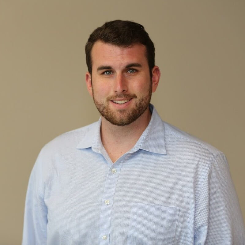 headshot of man in collared shirt