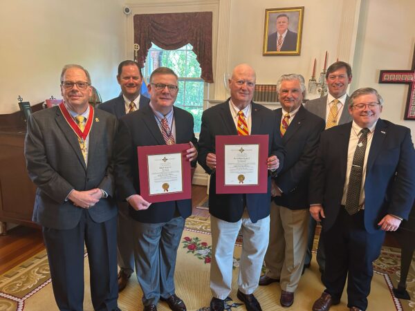 group of men in suits